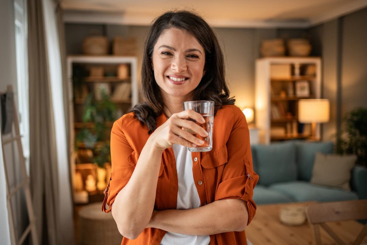 water intake - woman drinks water