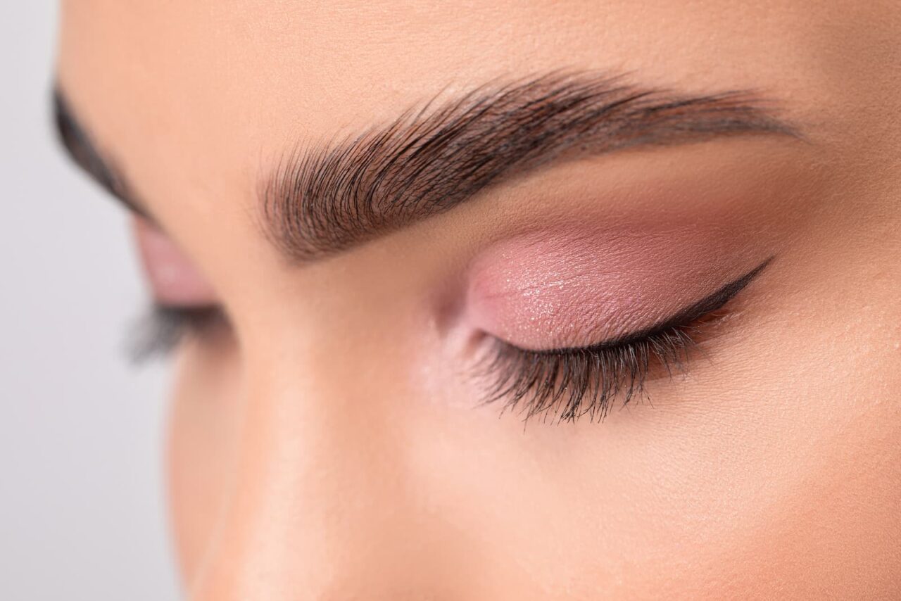 woman shows off her microblading treatment